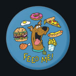Scooby-Doo Feed Me! Magnet<br><div class="desc">Add some playful charm to your space with this vibrant magnet featuring Scooby-Doo and the fun phrase "Feed Me." This colourful and nostalgic design captures Scooby’s lovable personality,  making it a perfect addition to your fridge,  locker,  or magnetic board.</div>