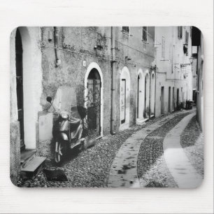 Scooter in a street in Italy in black and white Mouse Pad