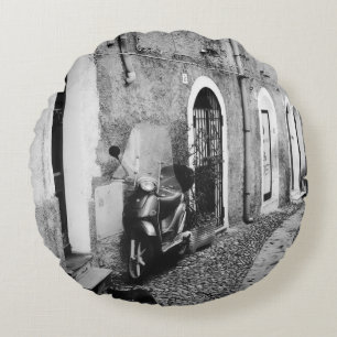 Scooter in a street in Italy in black and white Round Pillow