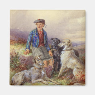 Scottish boy with wolfhounds in a Highland landsca Magnet