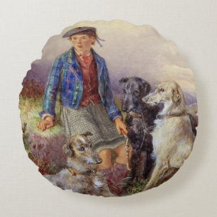 Scottish boy with wolfhounds in a Highland landsca Round Pillow