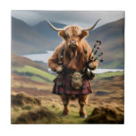 Scottish Highland Cow Bagpiper,  Tile<br><div class="desc">Pictured Dressed In A Kilt And Jacket In The Highlands Of Scotland,  A Highland Cow Is  Holding A Set Of Bagpipes.</div>