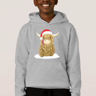 Scottish Highland Cow In The Christmas Snow