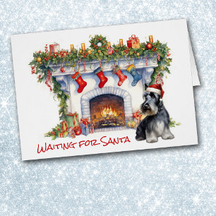 Scottish Terrier Dog attend la cheminée Père Noël