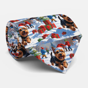 Scottish Terrier Running Snow with Christmas Hat Tie