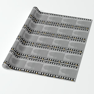 Scratched film strip, vintage placeholder. wrapping paper