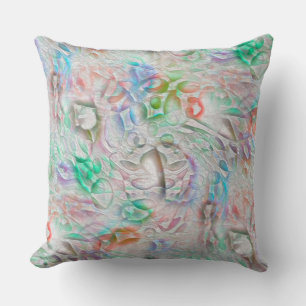 Scratched pixels in coloured texture over off-whit throw pillow