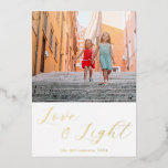 Script Love Light Simple Hanukkah Two Photo Gold Foil Holiday Card<br><div class="desc">Send warm Hanukkah wishes with this elegant "Love and Light" card, featuring your photo framed by beautiful script calligraphy in gold foil. The modern minimalist aesthetic adds a touch of sophistication, while the customizable text allows you to tailor the holiday greeting to your liking. Perfect for sharing the joy of...</div>