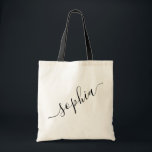 Script Name Personalized Modern Simple Tote Bag<br><div class="desc">Chic personalized labelled reusable canvas tote bag with custom name text for bridesmaid gifts, bachelorette parties, birthday favours, and girls trip keepsakes, and graduation gift for cute college and dorm room storage. Perfect for sports and hobby gear storage and transport. Colours and fonts are editable, just click “customize further” to...</div>