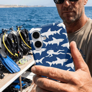 Scuba Diver Swimming with a School of Sharks