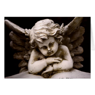 Sculpture de l'Ange Cupidon lisant un Livre