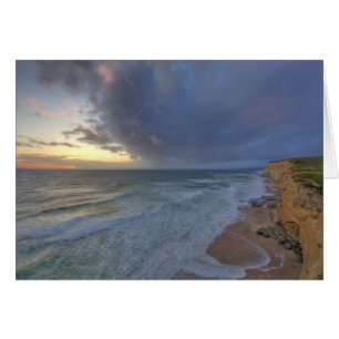 Sea cliffs catch days last light at Pomponi