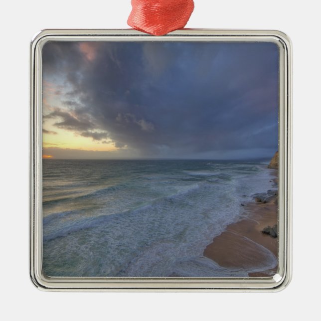 Sea cliffs catch days last light at Pomponi Metal Ornament (Front)