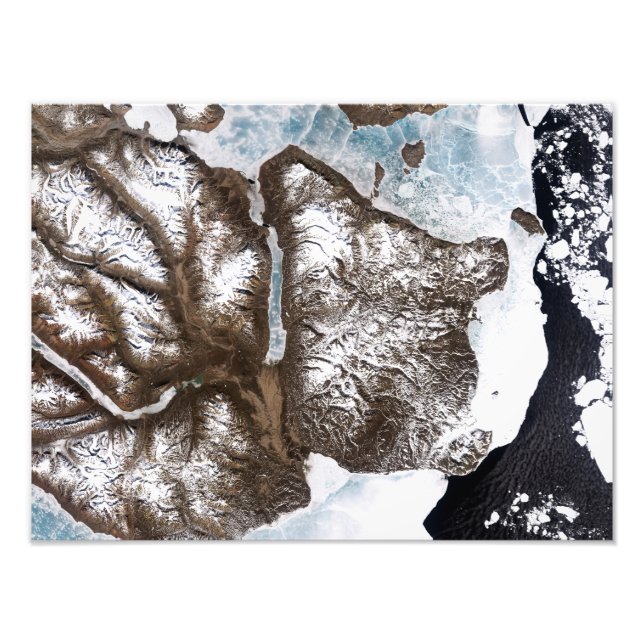 Sea ice lines the shoreline in eastern Greenlan Photo Print (Front)