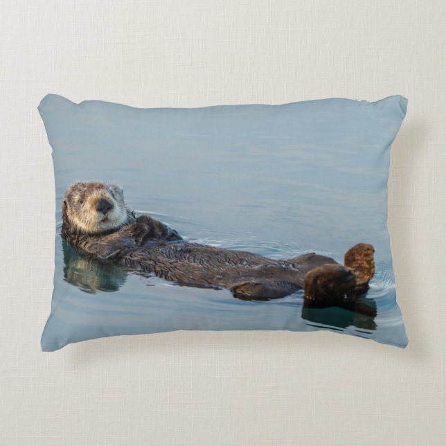 Sea otter floating on back in ocean accent pillow (Front)