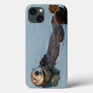Sea otter floating on back in ocean iPhone 13 case
