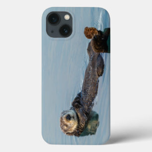 Sea otter floating on back in ocean iPhone 13 case