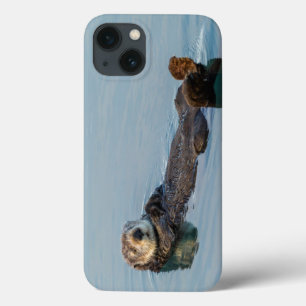Sea otter floating on back in ocean iPhone 13 case