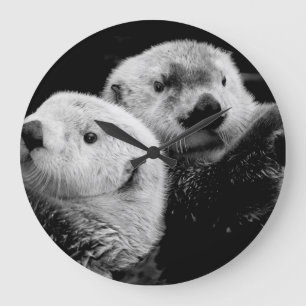 Sea Otters: Black White Pair. Large Clock