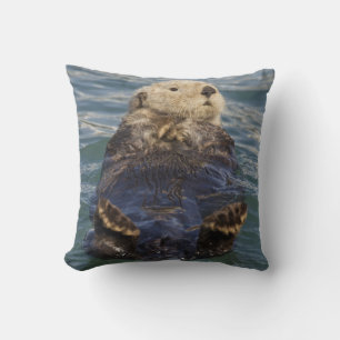 Sea otters play on icebergs at Surprise Inlet Throw Pillow