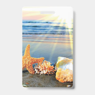 Sea shells and starfish on beach badge