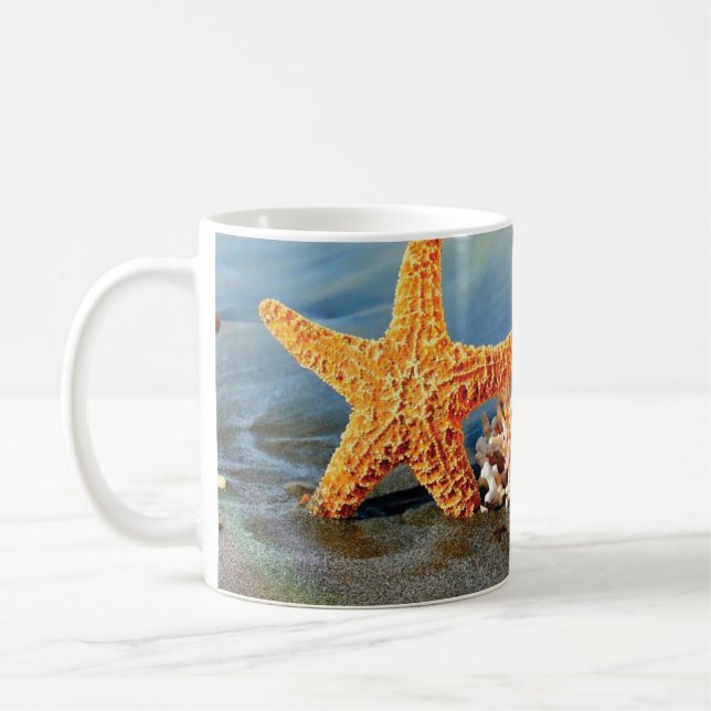 Sea shells and starfish on beach coffee mug (Left)