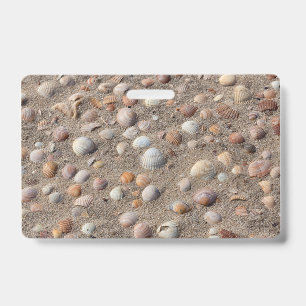 Sea shells at the beach badge