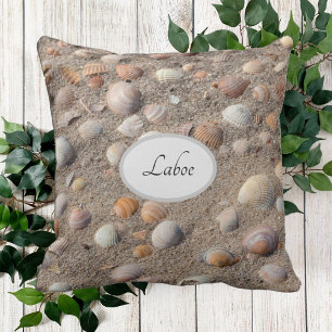 Sea shells at the beach photo with monogram throw pillow