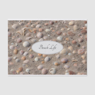 Sea shells at the summer beach photo with text tissue paper