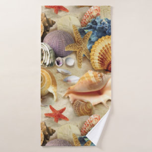 Sea shells on beach bath towel