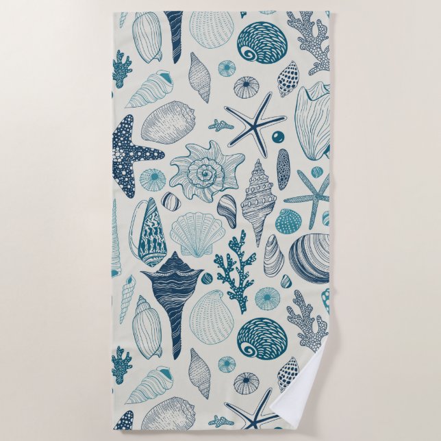 Sea shells on  off white beach towel (Front)