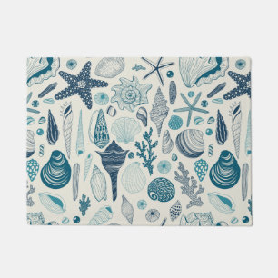 Sea shells on off white doormat