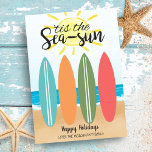 Sea Sun TropicalBeach Surfboard Coastal Christmas Holiday Card<br><div class="desc">Celebrate the season with a splash of coastal cheer! This tropical Christmas design features a row of colourful surfboards in the sand, set against a sunny ocean backdrop. With soft waves, warm skies, and beachy vibes, this festive scene brings a relaxed, seaside twist to the holidays—perfect for surf lovers, beachgoers,...</div>