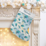 Sea Turtle Christmas Tropical Beach Sparkle Small Christmas Stocking<br><div class="desc">This personalized coastal themed stocking features a pattern of cute turquoise blue sea turtles on an abstract beach background with a faux glitter wave and sparkly star accents. Check out the collection for more matching products,  or contact me through Zazzle Chat if you need something special.</div>