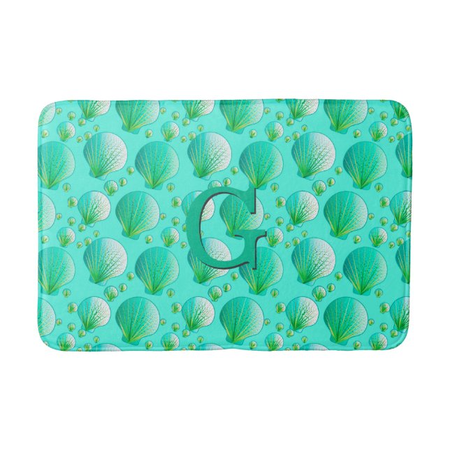 Seafoam green seashells on aqua bath mat (Front)