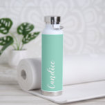 Seafoam Personalized Wedding Bridesmaid Water Bottle<br><div class="desc">Gift your wedding bridesmaid or maid or honour with this trendy, vacuum Insulated water bottle that features her name in white, stylized script on a seafoam colour background designed to match your wedding colour scheme. Personalize bottle by editing and replacing name with your own as desired. Select your water bottle...</div>