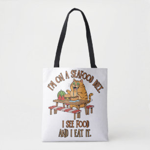 Seafood Diet Joke – Hungry Cat with Hot Dog Tote Bag