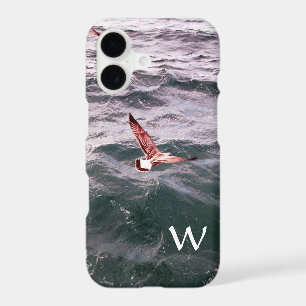 SEAGULL VOL AU-DESSUS DU MONOGRAM DES VAGES