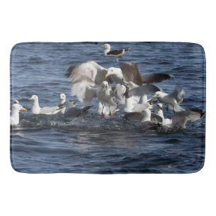 Seagulls Feasting on Sand Eels Bath Mat