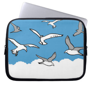 Seagulls flying high in the sky. laptop sleeve