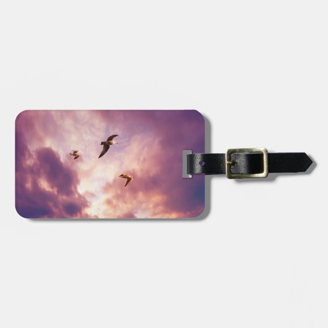 Seagulls flying in a sunset sky luggage tag (Front Horizontal)