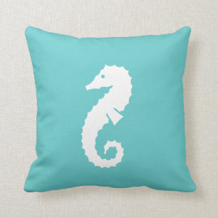 SEAHORSE BLANC sur coussin bleu turquoise