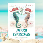 Seahorse Santa Mistletoe Kiss Coastal Christmas Holiday Card<br><div class="desc">Share some love with this coastal Christmas card featuring watercolor seahorses in Santa hats kissing under mistletoe on a tropical beach.  Art by KL Stock.</div>