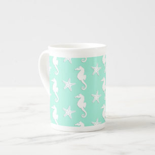 Seahorse & starfish - white on pale aqua bone china mug