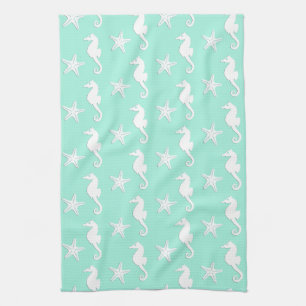 Seahorse & starfish - white on pale aqua kitchen towel