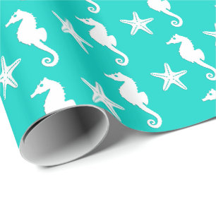 Seahorse & starfish - white on turquoise wrapping paper