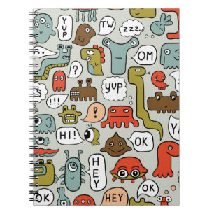 seamless background with cute cartoon monsters notebook