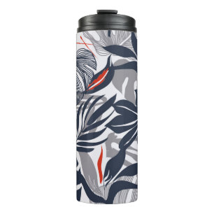 Seamless floral pattern from exotic jungle plants. thermal tumbler