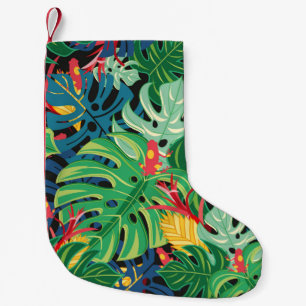 Seamless graphic pattern with leaves monstera and  small christmas stocking