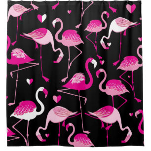Seamless pattern from pink flamingos on a dark bac